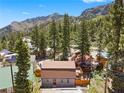 Aerial view of a charming home nestled in a mountain setting at 4765 Silver Tip Trl, Mount Charleston, NV 89124