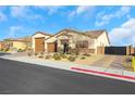 Two-story house with a large driveway and gated entrance at 6364 Cambridge Creek Ct, Las Vegas, NV 89149