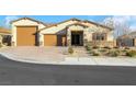 Single-story house with a two car garage and well maintained yard at 6364 Cambridge Creek Ct, Las Vegas, NV 89149