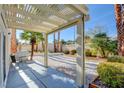 Relaxing backyard patio with pergola and grill at 1717 Imperial Cup Dr, Las Vegas, NV 89117