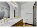 Elegant bathroom with double vanity and gold fixtures at 1717 Imperial Cup Dr, Las Vegas, NV 89117