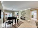 Spacious living room with hardwood floors and a grand piano at 2373 Rosendale Village Ave, Henderson, NV 89052