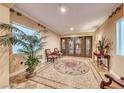 Spacious lobby with seating area and decorative tile floor at 30 Via Mantova # 108, Henderson, NV 89011