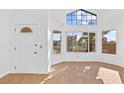 Bright living room with hardwood floors and large windows at 3139 Ocotillo Dr, Laughlin, NV 89029