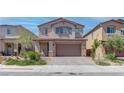 Two-story home with attached garage and landscaped front yard at 4138 Bayley Skye Ave, Las Vegas, NV 89141