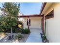 Home features a covered patio and walkway to the front door at 659 I, Boulder City, NV 89005