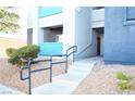 Apartment building entrance with stairs and handrail at 6955 N Durango Dr # 1085, Las Vegas, NV 89149