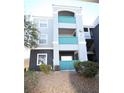 Three-story apartment building with teal accents at 6955 N Durango Dr # 1085, Las Vegas, NV 89149