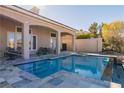 Resort-style pool and patio area at 9316 Provence Garden Ln, Las Vegas, NV 89145