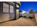 Private backyard patio with brick pavers at 11870 Star Grass Ave, Las Vegas, NV 89138