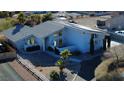 Single story home with solar panels and desert landscaping at 1761 Augusta St, Pahrump, NV 89048