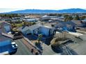 Single story home with solar panels and desert landscaping at 1761 Augusta St, Pahrump, NV 89048