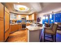 Gourmet kitchen with wood floors and stainless steel appliances at 222 Karen Ave # 2708, Las Vegas, NV 89109