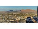 Scenic aerial view of Las Vegas, featuring mountains, cityscape, and desert landscape at 222 Karen Ave # 3601, Las Vegas, NV 89109