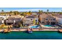 Luxury home on the waterfront with a private dock and pool at 2469 Sun Reef Rd, Las Vegas, NV 89128