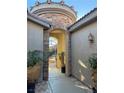 Stone arch entryway with tile flooring and potted plants at 2558 Sparrow Way, Pahrump, NV 89048