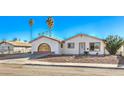 Ranch style home with carport and landscaped yard at 3091 Liberty Cir, Las Vegas, NV 89121