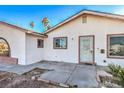 Front view of ranch home with mature landscaping at 3091 Liberty Cir, Las Vegas, NV 89121