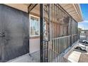 View of a secured entrance with metal gate and door at 4186 Silver Dollar Ave # 8, Las Vegas, NV 89102