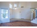 Bright living room with hardwood floors and high ceilings at 7608 Botany Bay Dr, Las Vegas, NV 89128