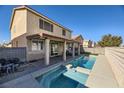 Relaxing backyard oasis featuring a sparkling pool and spa at 9154 Cazador St, Las Vegas, NV 89123