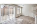 Bright dining area with sliding glass doors leading to backyard at 9998 Ullom Dr # 16, Las Vegas, NV 89141