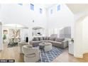 Spacious living room with vaulted ceilings and an open floor plan at 185 Rocky Star St, Henderson, NV 89012