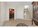 Bright and spacious entryway with access to the home theater and stairs at 1319 Red Baron Ln, Boulder City, NV 89005