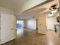 An open-concept living space featuring wood floors and natural light at 2606 S Durango Dr # 171, Las Vegas, NV 89117