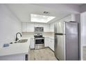 Modern kitchen with stainless steel appliances at 1701 E Katie Ave # 10, Las Vegas, NV 89119