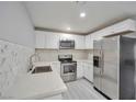 Modern kitchen with stainless steel appliances at 1701 E Katie Ave # 32, Las Vegas, NV 89119