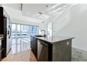 Modern kitchen with granite island, stainless steel appliances, and city views at 4471 Dean Martin Dr # 507, Las Vegas, NV 89103