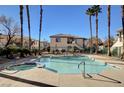 Inviting pool and spa area, surrounded by lush landscaping at 5100 Jordan Frey St # 203, Las Vegas, NV 89130
