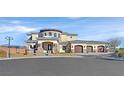 Beautiful two-story home with a three-car garage, stone accents, and well-maintained landscaping at 5790 Aspen Falls Cir, Las Vegas, NV 89149