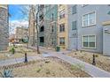 Building exterior showing walkway and landscaping at 26 E Serene Ave # 124, Las Vegas, NV 89123