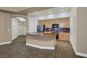 Gourmet kitchen with stainless steel appliances, granite countertops, and ample cabinet space at 26 E Serene Ave # 124, Las Vegas, NV 89123