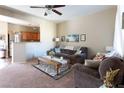 Comfortable living room with view into the kitchen, offering a relaxed and inviting atmosphere at 4625 Centisimo Dr # 202, North Las Vegas, NV 89084