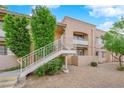 Building exterior showcasing stairs and landscaping at 5134 S Jones Blvd # 202, Las Vegas, NV 89118