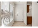 Bright entryway with tile flooring and interior door at 1327 Beehive Ln, Mesquite, NV 89034