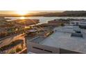 Luxury home community with lake views at sunset at 36 Rainbow Point Pl, Henderson, NV 89011