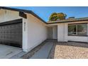 Front entry and garage of a single story home at 4111 E Saint Louis Ave, Las Vegas, NV 89104
