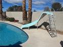 Fun backyard pool slide, providing entertainment and recreation for all ages at 3034 Chapala, Las Vegas, NV 89120