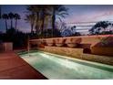 Backyard pool featuring a water feature with several water bowls set against a desert landscape at 36 Avenida Fiori, Henderson, NV 89011