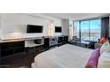 Bright bedroom, featuring a large bed and city views at 4381 W Flamingo Rd # 3309, Las Vegas, NV 89103
