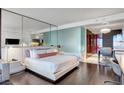 Modern bedroom with a large bed and city view at 4381 W Flamingo Rd # 3309, Las Vegas, NV 89103