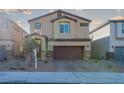 Two-story house with attached garage and front yard at 487 Via Renata, Henderson, NV 89044