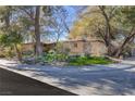 Ranch style home with curb appeal and mature trees at 1200 Cashman Dr, Las Vegas, NV 89102