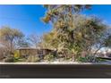House exterior showcasing landscaping and curb appeal at 1200 Cashman Dr, Las Vegas, NV 89102