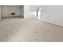 Bright living room with neutral carpeting and fireplace at 2736 Taylor Ave, North Las Vegas, NV 89030