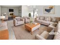 Spacious living room featuring a fireplace and ample seating at 2736 Taylor Ave, North Las Vegas, NV 89030